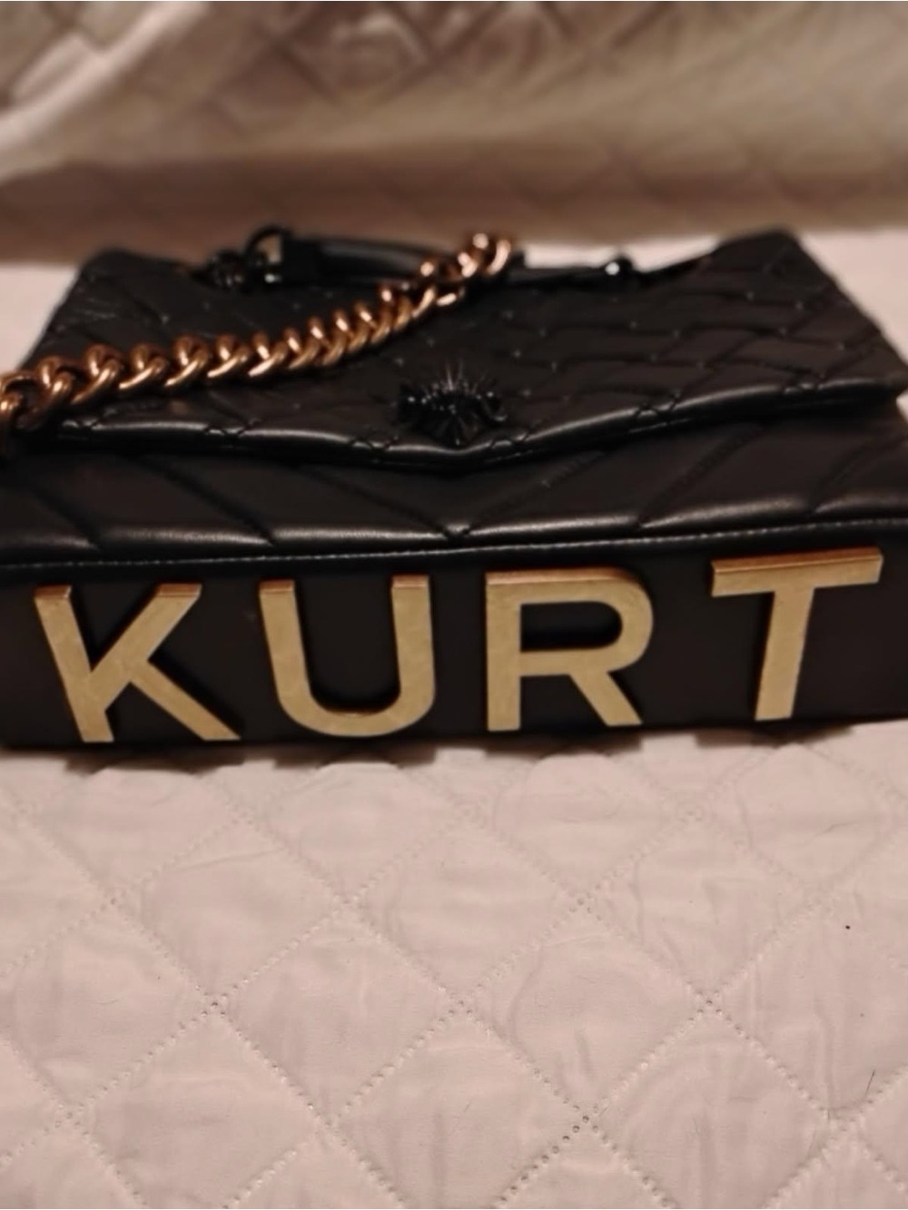 Kurt Geiger Black Quilted Crossbody with Gold Lettering and Chain